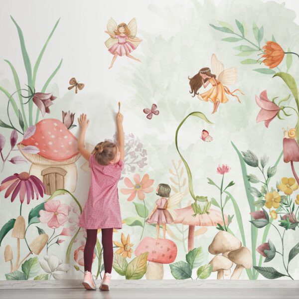 Cute little girl painting on wall in empty room